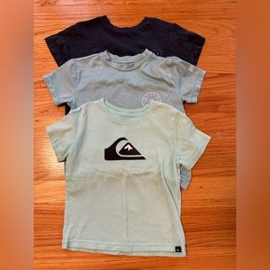 Lot of 3 boys quicksilver and billabong shirts.